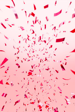 3D rendering of falling red confetti on a pink background. Festive backdrop perfect for holiday sales, celebrations, weddings, Valentine&rsquo;s Day, and promotional banners.