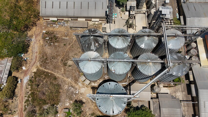 Metal grain silos at an industrial farm in South Kalimantan, Indonesia © Salsabila Ariadina