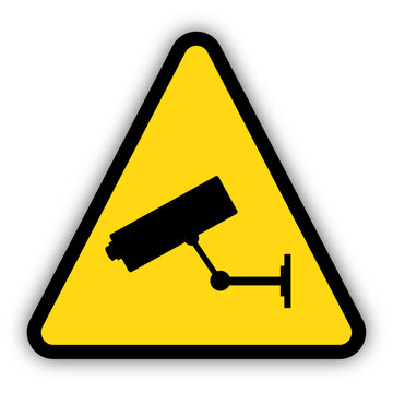 CCTV surveillance security camera on a yellow triangle warning sign. Transparent background.