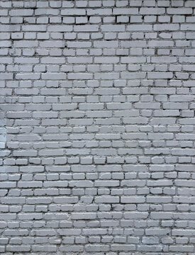 White brick wall texture. Old weathered brickwork background