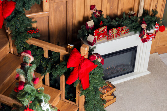 Cozy cottage interior decorated for Christmas with a fireplace and festive holiday ornaments