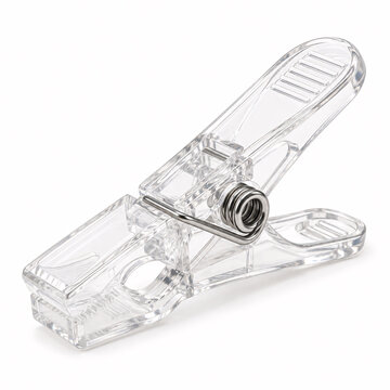 Clear plastic clothespin clamp on white