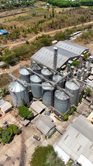 Aerial view showing metal silos and industrial buildings for grain storage in South Kalimantan © Salsabila Ariadina