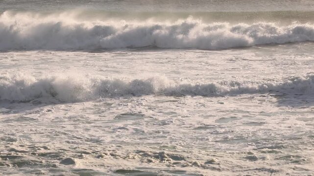 glorious Walker Bay Nature Reserve and massive wave sets, in late afternoon light , South Africa