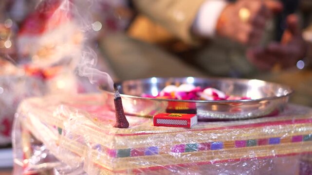Incense stick burning during an Indian marriage ceremony in Lucknow Uttar Pradesh