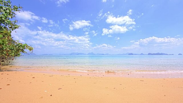 Paradise beach with sand and turquoise water on a tropical island in Phang Nga Bay, Thailand