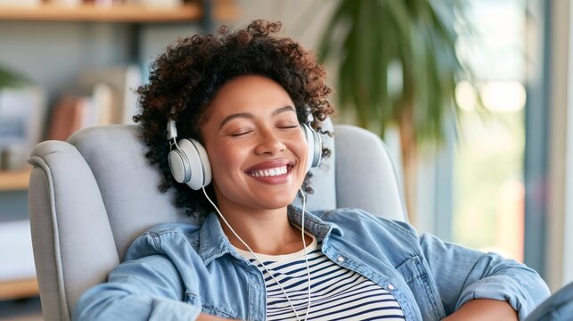 Happy woman listening to music relaxing at home