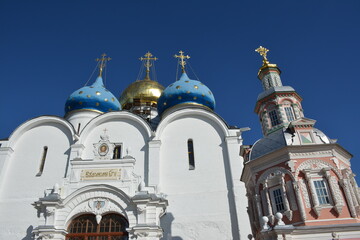Blue domes and golden crosses on a church in a clear sky during the daytime © Alexander