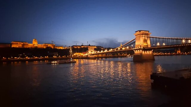 Illuminated Chain Bridge and Buda Castle Reflections on the Danube at Night