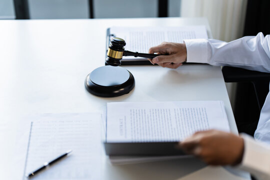 Lawyer working legal data contract at law firm