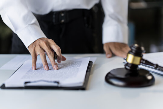 Lawyer working legal data contract at law firm