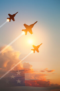 Air Force Day. Aircraft silhouettes on background of sunset with a transparent American flag. Vertical poster.