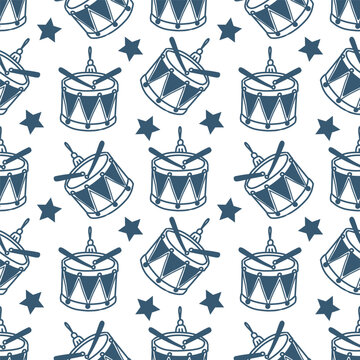 Seamless hand drawn Christmas pattern with festive ornaments, toy drums  in blue on a white background. Winter holiday design for wrapping paper, textiles and stationery.