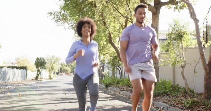Lifestyle videos outdoor of people doing activities, jogging together, man and woman exercising outd