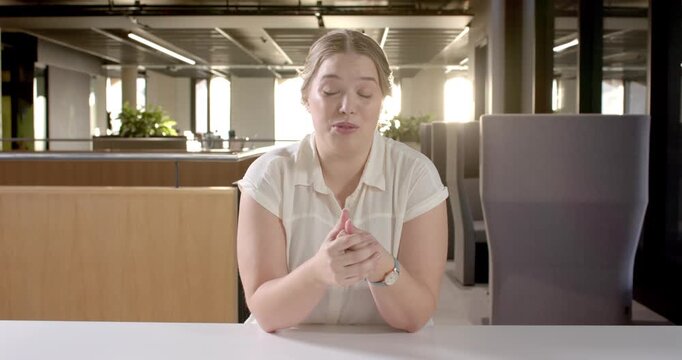 Close up of people talking to the camera, businesswoman in office using hand gestures