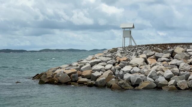 White Lifeguard Tower on Rocky Breakwater at Khao Laem Ya