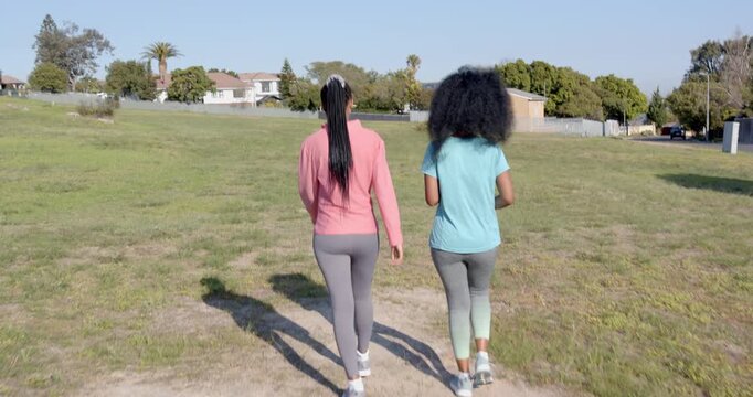 Lifestyle videos outdoor of people doing activities, Walking outdoors, two women in activewear enjoy