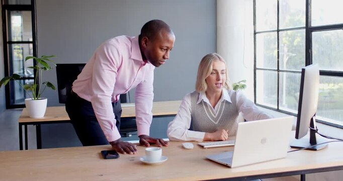 Lifestyle videos indoor of people doing activities at office, colleagues using laptop and desktop co