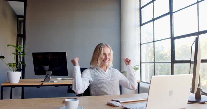 Lifestyle videos indoor of people doing activities at office, celebrating success, woman in office u