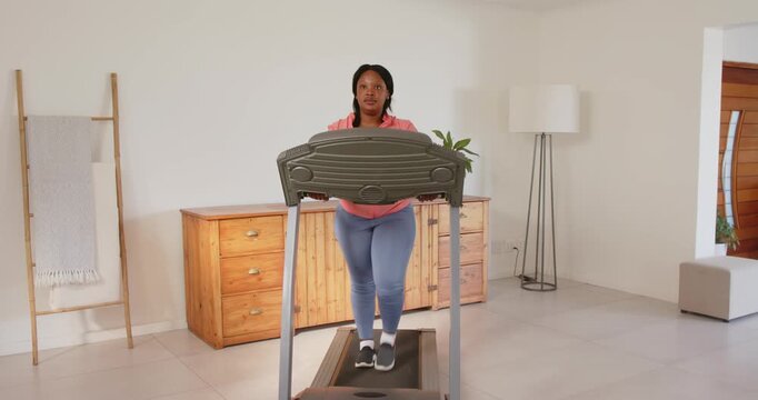 Lifestyle videos indoor of people doing activities at home, exercising on treadmill, woman in active