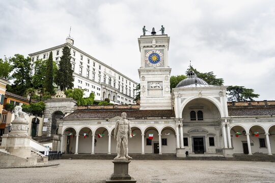 Piazza della Libert&agrave; main square with Loggia e Tempietto di San Giovanni and clock tower, Castello di Udine in the back, old town, Udine, Friuli-Venezia Giulia, Italy