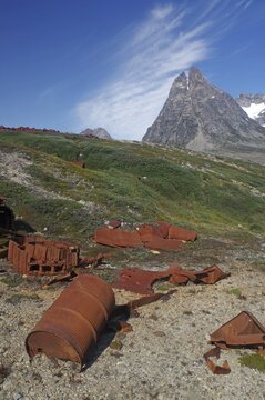 Rusted barrels from 1947 in Arctic landscape, Ikateq Army Base, East Greenland, Arctic, Greenland, North America, Denmark