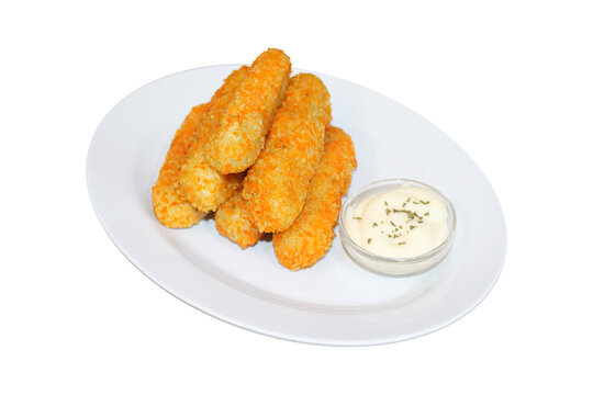 Crispy fried mozzarella cheese sticks served with mayonnaise dipping sauce on white plate isolated