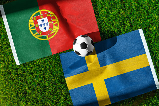 Portugal vs. Sweden football match. National flags on green grass with soccer ball in the middle. Football background for international match.