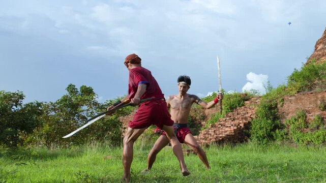 Thai Warriors Performing Traditional Sword Martial Arts Battle