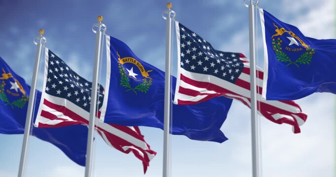Nevada and american flag waving in the wind on a clear day