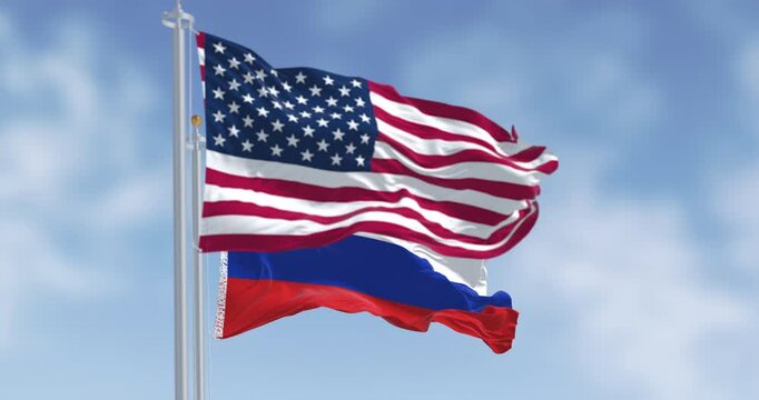National flags of Russia waving in the wind on a clear day