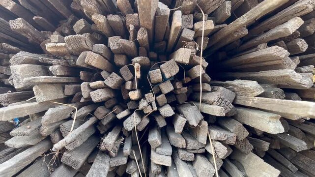 Close up view of stacked weathered wooden laths