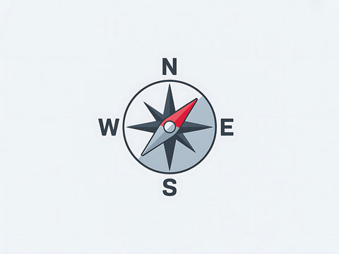 Compass needle pointing north on a neutral surface representing direction and guidance for travel and exploration