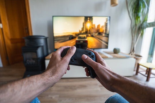 Employee playing video game, enjoying a sick day