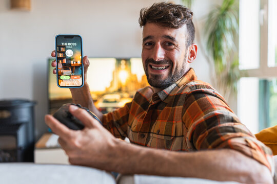 Man enjoying gaming sick day ignoring boss call