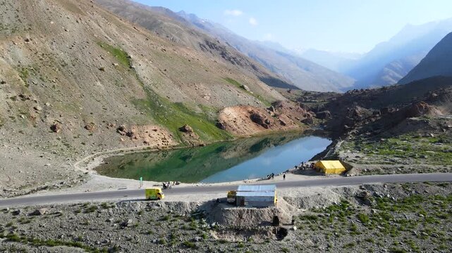 Drone shot of bike passing by Deepak Tal in Lahaul, Himachal Pradesh