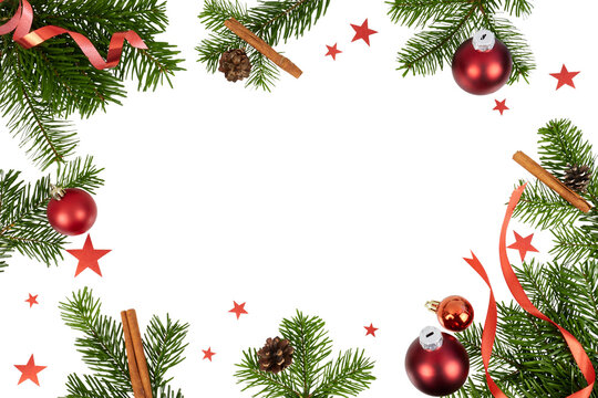 frame or backgorund of christmas decorations with fir tree branches, cinnamon sticks, xmas balls, ribbon band and tiny red stars isolated on white or transparent png