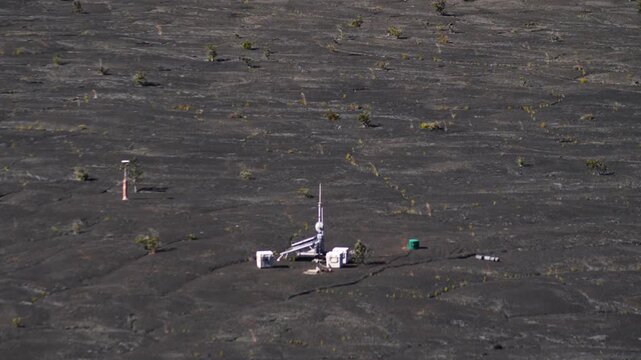 Volcanic Activity Monitoring Station on Black Hardened Lava Field