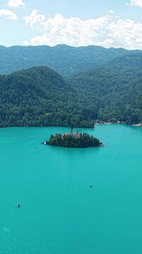 Vertical Drone View of Lake Bled, Slovenia, Turquoise Alpine Water, Island and Hills of Julian Alps