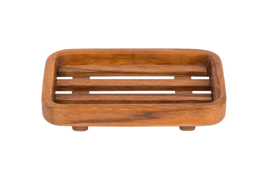 Natural brown wooden soap dish with slatted design and small feet, photographed on a clean white background