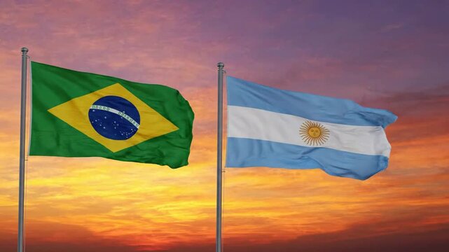 Brazil and argentina flags waving together against a dramatic sunset sky, international diplomacy and cooperation concept