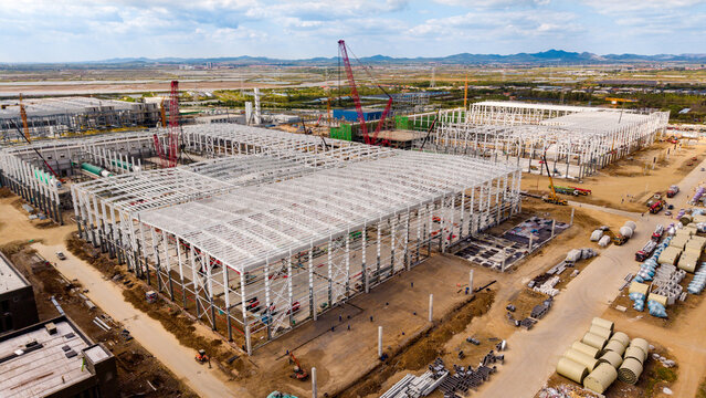 Large Industrial Building Steel Structure Under Construction at Site
