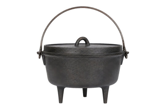 Rustic black cast iron Dutch oven with a lid and three legs, featuring a sturdy metal bail handle, isolated on a clean white background