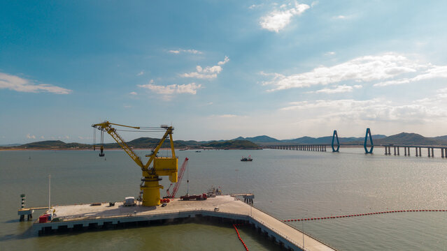 Port Terminal with Crane and Bridge Over Waterway