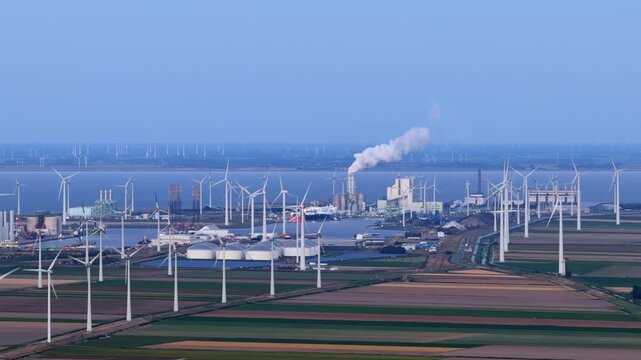 Aerial view of wind turbines in the industrial port of eemshaven