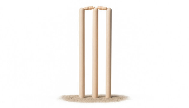 Gold-colored cricket wicket set with three stumps and two bails on neutral studio background