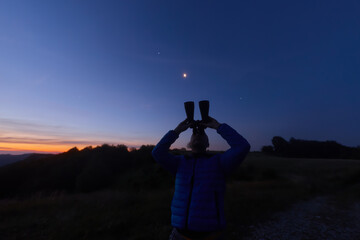 Amateur astronomer observing stars, planets and other celestial objects. © astrosystem