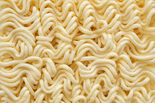 dry instant noodles texture background close up
