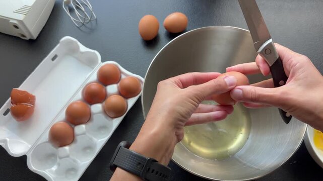 Separating egg yolks from whites for baking. Preparation process for baking or cooking