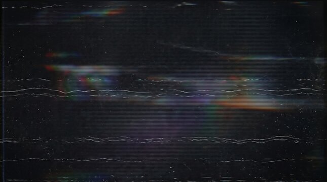 Damaged vhs tape with horizontal lines with distortions scratches across magnetic tape damage signal loss